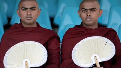 Reuters Buddhist monks Padiyapalalle Sugathasara and Padiyapalalle Vipulasara