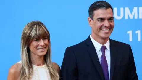  REUTERS/Yves Herman Spanish Prime Minister Pedro Sanchez and his wife Begoña Gomez arrive at a dinner hosted by Lithuanian President Gitanas Nauseda, during a NATO leaders summit in Vilnius, Lithuania July 11, 2023