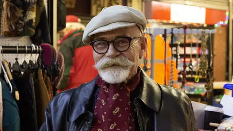 Man with beard and glasses