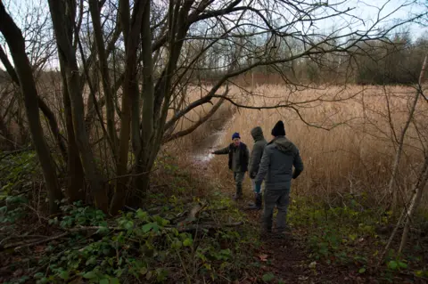 BBC David instructs trainee members of the birding group