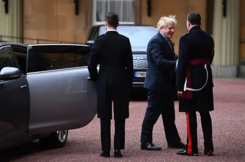 Victoria Jones / PA Prime Minister Boris Johnson arrives at London's Buckingham Palace for an audience with Queen Elizabeth II