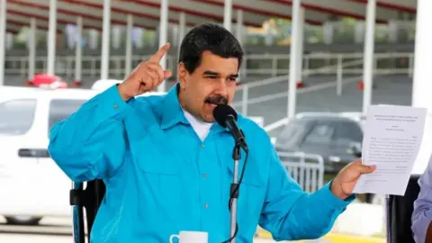 EPA A handout photo made available by Miraflores, shows the Venezuelan President Nicolas Maduro, speaks during a government event, in Caracas, Venezuela, on 02 November