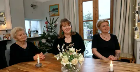 The One Show Angelina Retunskaia (left) with grand daughter Kateryna Sheluntsova (middle) and her mother Kseniia Skakun (right)