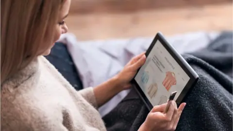 Getty Images woman on tablet