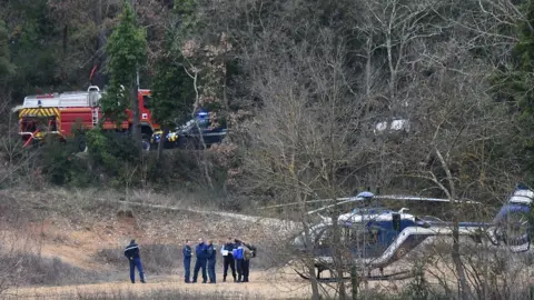 AFP Rescuers at the crash site, 2 Feb 18