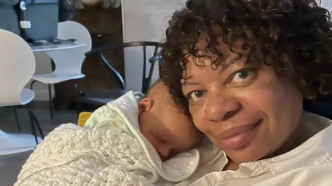 Debbie Potts Debbie Potts with her grandchild