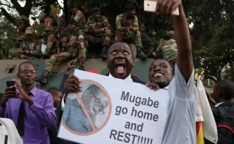 Reuters Zimbabweans celebrate after President Robert Mugabe resigns in Harare, Zimbabwe November 21 2017