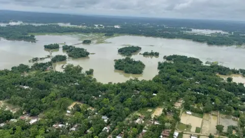Reuters An aerial view shows flooded areas in Silchar in the north-eastern state of Assam