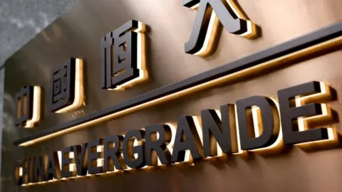 Reuters Evergrande sign.