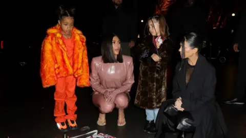 Getty Images North West, Kim, Penelope Disick and Kourtney