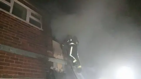 West Midlands Fire Service Crews attending the flat fire in Bartley Green
