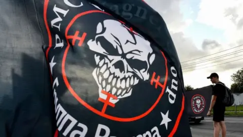 Getty Images A PMC Wagner flag flying