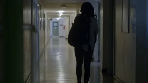 BBC Panorama  Girl walking in school corridor