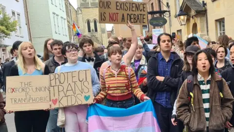 BBC Protesters gather outside the Oxford Union during a talk by Prof Kathleen Stock