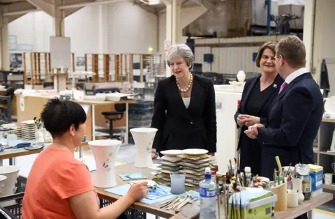 Reuters Theresa May and Arlene Foster visiting Belleek Pottery in County Fermanagh
