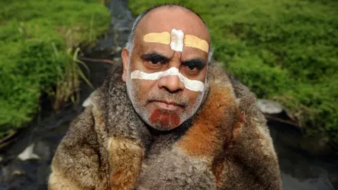 Getty Images Aboriginal elder Gary Murray, pictured wearing traditional dress