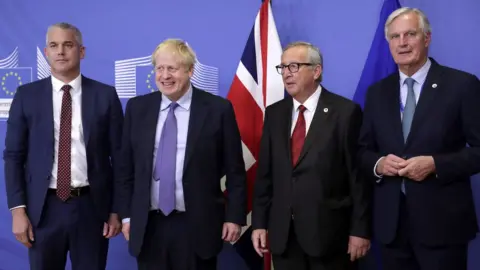 EPA European Union chief Brexit negotiator Michel Barnier (R), President of the European Commission Jean-Claude Juncker (2-R), British Prime Minister Boris Johnson (2-L) and UK Brexit Secretary Stephen Barclay
