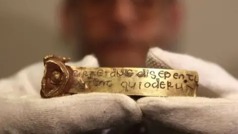 Getty Images A golden fragment that was part of the Staffordshire Hoard