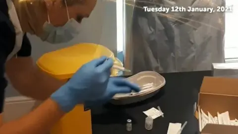 Home From Home Care Vaccine jab being prepared