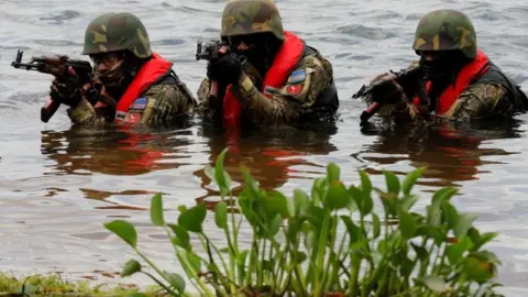 Reuters Cabo Verdean military personnel train during the annual counter-terrorism program called "Operation Flintlock", in Sogakope, Ghana March 14, 2023
