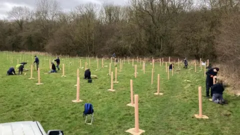 Swindon Borough Council Volunteers planting trees at Stanton Park