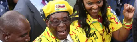 EPA Robert and Grace Mugabe