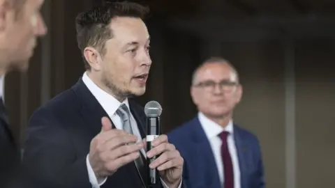 EPA Tesla chief Elon Musk speaks following the announcement in Adelaide