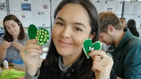 Leila Bousbaa Leila Bousbaa with some green hearts