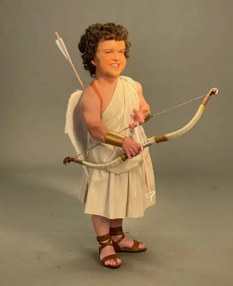 George Coppen George dressed as Sweet Cupid in fantasy film The School for Good and Evil