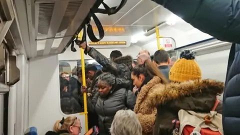 Daniel Fulton/PA Wire Crowded train