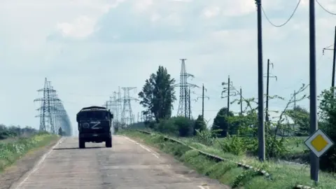 Getty Images Russian vehicle on a road in Kherson