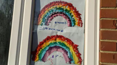 children's rainbows in windows