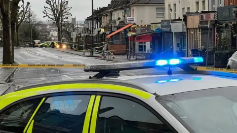 BBC A road cordoned off by police after a stabbing