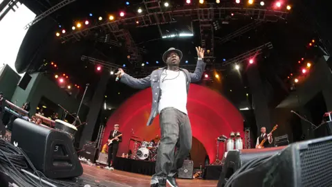 Getty Images Rapper Blitz The Ambassador performs at the OkayAfrica World Cup 2010 Finals Party