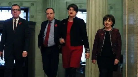 PA Nigel Dodds (centre left), Arlene Foster and other DUP politicians