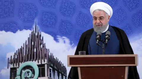 EPA Iranian President Hassan Rouhani speaks at the Noavari factory in Tehran, Iran (5 November 2019)