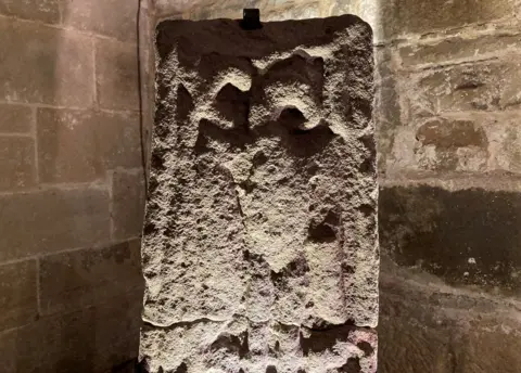 BBC/Charles Heslett The top section features a carving of a bird, believed to be an eagle and symbol of St John the Baptist.