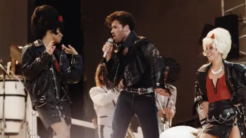 Pete Still Pepsi & Shirlie on stage with Wham