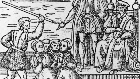 Getty Images A woodcut of a witch trial