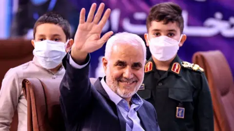 Getty Images Mohsen Mehrazlizadeh and his grandsons