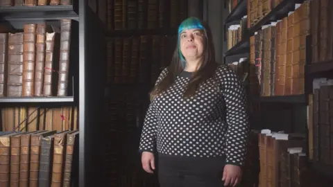 Sarah in the special collection library