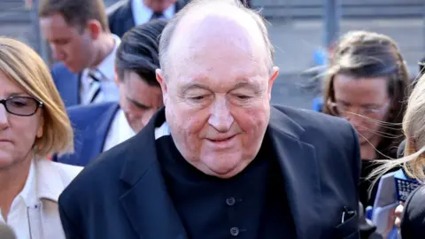 EPA Archbishop Philip Wilson leaves a court after his conviction in May