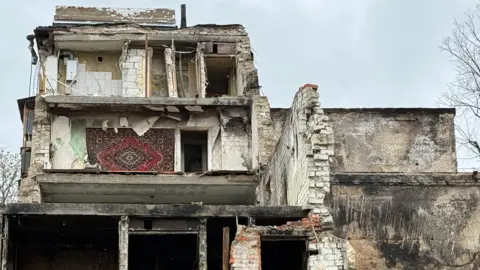 A shattered building in Kharkiv.