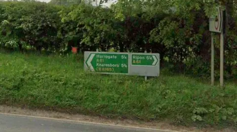 Google Harrogate and Ripon road sign