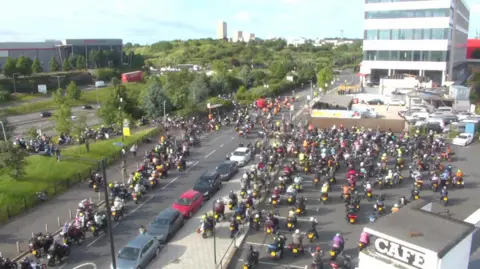 BBC Motorcyclists setting off on Dave Day cavalcade