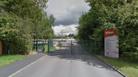 Google The main entrance to E:On's former headquarters in Coventry. The firm's sign is on the right of the picture, next to locked green metal gates.
