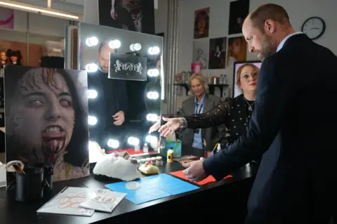 PA Media Prince William in the make-up department at the London Screen Academy