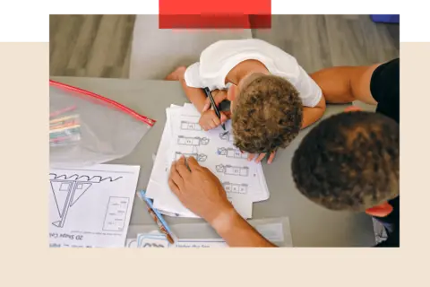 Getty Images A parent helping their child with homework