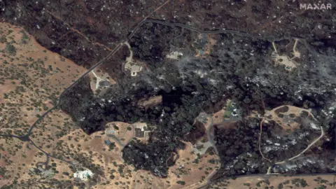 Reuters Satellite image shows a residential area affected by the Park Fire, in Chico, California, U.S., July 26.