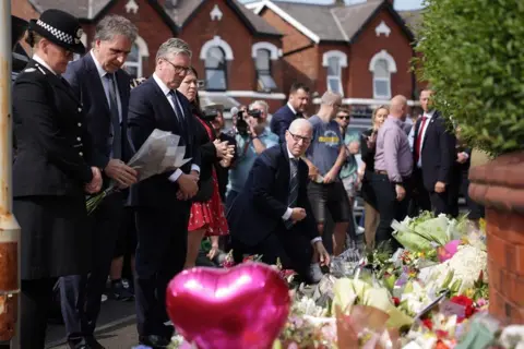 PA Media Sir Keir Starmer laid flowers close to the scene on Tuesday